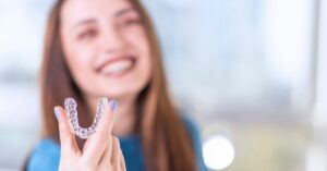 How long does a clear orthodontic treatment with Invisalign® trays last?